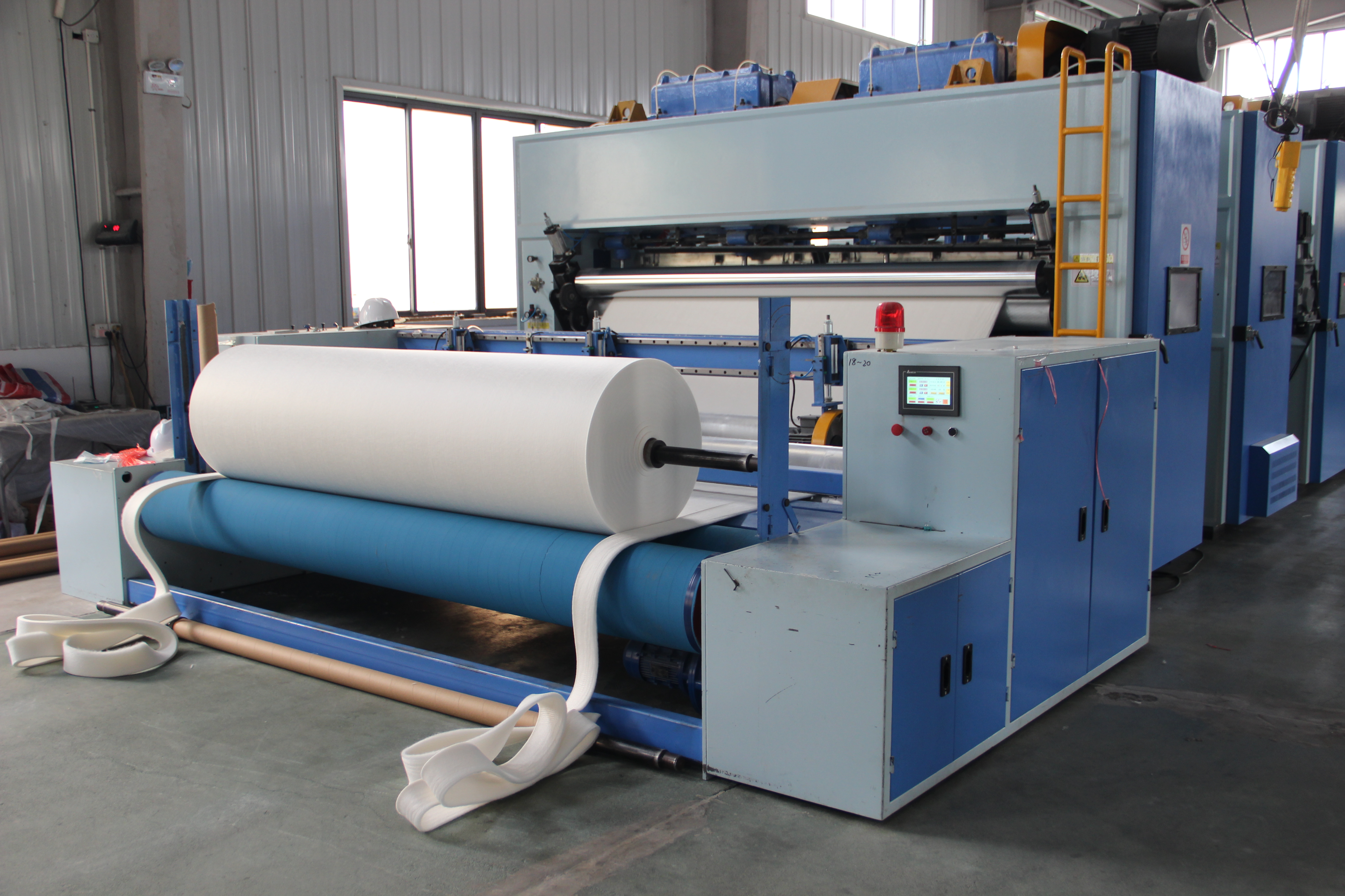 Cutting and winding machine
